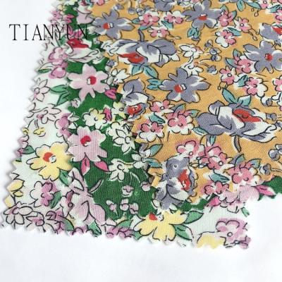 China Materials Anti-static Cotton Floral Printed 100% Cotton Fabrics For Women Garment for sale