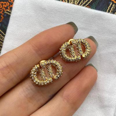 China FASHIONABLE Hot Selling Channel Setting Earrings for sale