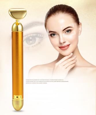 China Family Face Lift 3D Massage Roller Vibrating Energy Golden Beauty Facial Bar for sale