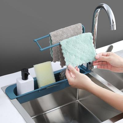 China Adjustable Cart Stocked Plastic Kitchen Sink Organizer For Faucet Rack Sponge Drain Organizer for sale