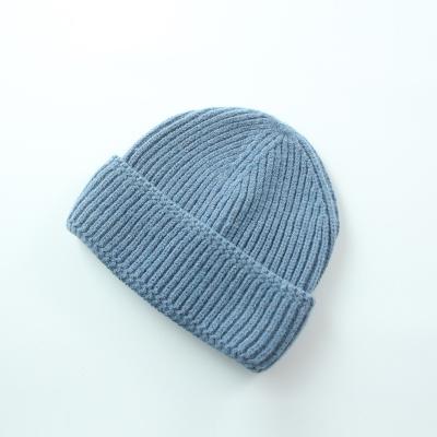 China Fashion JOINT Color Designed Custom Leather Label Knit Hat Winter Beanie 100% Acrylic Men Women Knit for sale