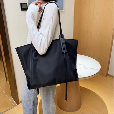 China 2021 Oxford Women's Tote Bag Shoulder Bag Laptop Handbags Large Lightweight Stylish Black Handbags for School Work Travel for sale