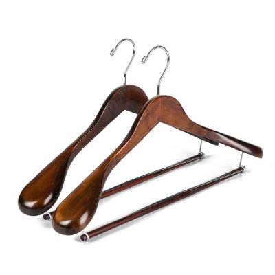 China Customized Durable Heavy Duty Brown Wooden Coat Hanger Shoulder Wide Hangers For Suits for sale