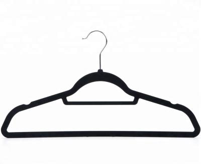 China Multifunctional Black Notched Flat Plastic Velvet Clothing Hangers for sale