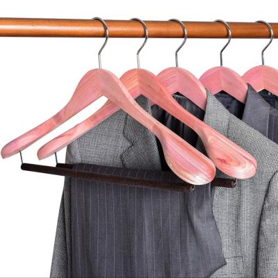 China Aromatic American Style No Paint Natural Red Cedar Wood Suit Coat Hangers With Velvet Bar for sale