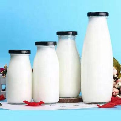 China Eco-Friendly Reusable Recycled Glass Juice Milk Water Bottle From Beverage Factory Factory for sale