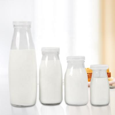 China factory price 1 liter reusable glass milk beverage bottle for sale