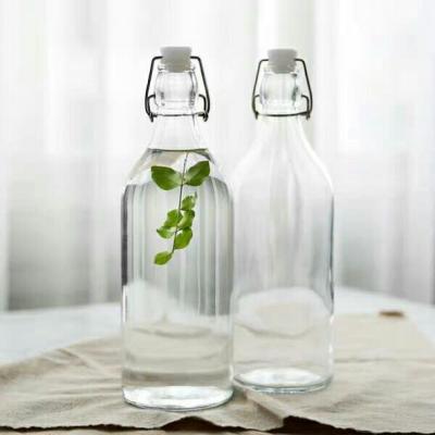 China Factory Produced Beverage Food Grade Glass Bottle With Swing Top for sale