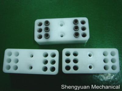 China Precision Machined Plastic Parts White POM / Derlin Adjusting Unit Trapped with Bohrbuchse for sale