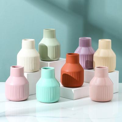 China Nordic minimalist durable Matte Color Ceramic and porcelain Bud Vases a flower decoration flower bottle vase for sale