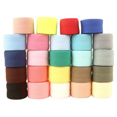 Cina Factory sales color elastic bias tape edge wrap elastic band rolling webbing nylon fold over elastic for garment bias in vendita