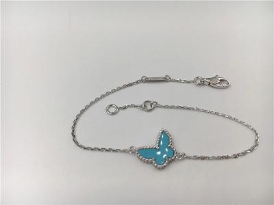 China Zoete witte 18KT gouden armband Turquoise met een vlinder steen Te koop