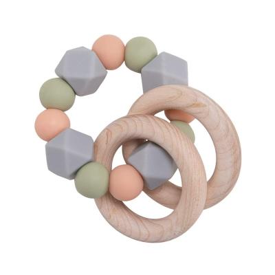 China Soft Toy Baby Gift Set Molars Non-Toxic Natural Beech Non-Toxic Natural Beech Wooden Bib Toy Wristband Silicone Wooden Toy Baby Toy for Wholesale for sale