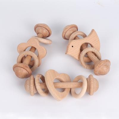 China Nipple Clip Natural Safety Handmade Wooden Baby Eco-Friendly Wooden Rattles And Teethers Toys for sale