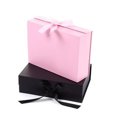 China Magnetic Closure Cardboard Box Hamper Pink Corrugated Boxes Gift Mailer With Ribbon for sale