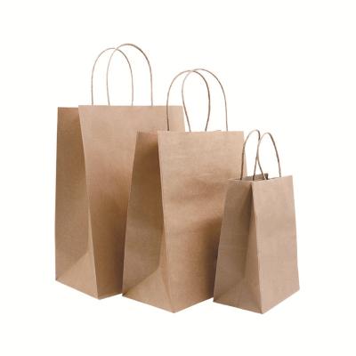 China Custom Offset Printing Kraft Paper Gift Bag With Twisted Handle for sale