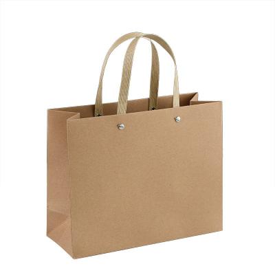 China Art Paper Non Laminated Gift Paper Bag Brown Kraft Handle Custom Print for sale