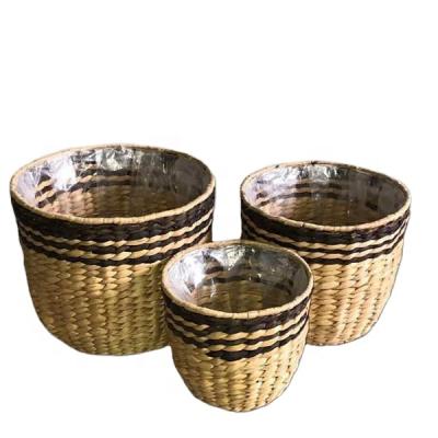 China Large Sustainable Cheap Natural Handmade Water Hyacinth Basket Rattan Plant Basket Storage for sale