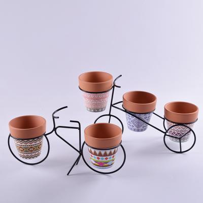 China Modern Design Terracotta Pot Wrought Iron Clay Pot Ceramic Pottery Planter For Home Decoration for sale