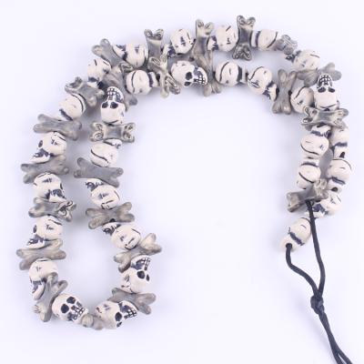 China Fashionable Stone Age Style Adult Caveman Waist Skull And Bone Necklace/Woman/Kids Jewelry for sale