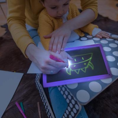 China LED Light Up Drawing Board Graffiti Doodle Drawing Tablet Magic Suction With Light Fun And Toy Dark Children Funny Toys Developing for sale