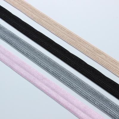 China 15mm Shiny Elastic Belt Shiny Smooth Elastic Gold Silk Silk Nylon Elastic Band Binding Band for sale