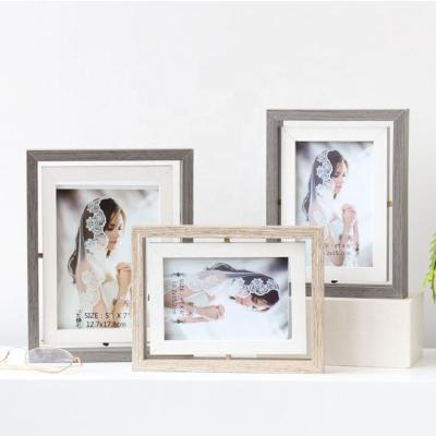 China Wall Picture Frame Office Decoration Customized Creative Eco Friendly Wooden Rotating Wedding Photo Frames for sale