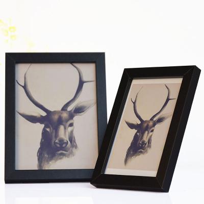 China Fashion Contemporary and Contracted Wood Picture Poster Picture Art Frames Wall Frames For Home Decor Picture Frame Single Bulk Wood Poster Hanger for sale