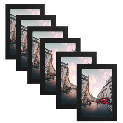 China Fashion Contracted Wood Frame Photo Poster Picture Art Frames Wall Frames For Home Decor Picture Frame Simple Bulk Wood Poster Hanger for sale