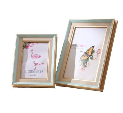 China Simple environmental materials and creative children's picture frame wall picture frame photo frame prints wall table top for sale