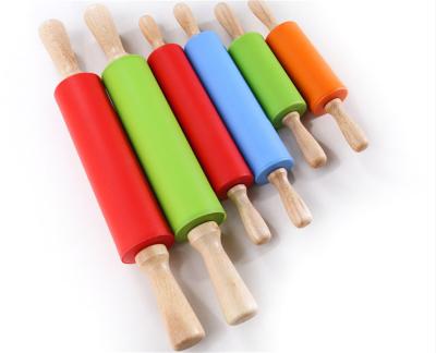 China 3 size workable non-stick silicone pin with wooden handle or plastic handle for sale