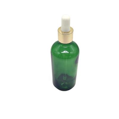 China Personal Care 100ml Green Glass Essential Oil Bottle With Dropper Or Gold Cap for sale