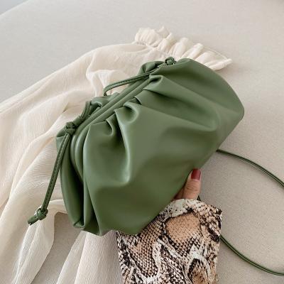 China Cane female fold clip female grass bag fashion bag slung shoulder cloud bag for sale