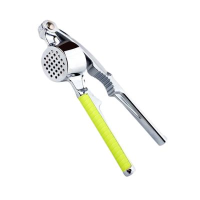 China Viable Home Kitchen Accessories Use Multifunctional Instrument Zinc Alloy Garlic Press for sale