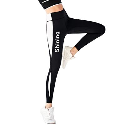 China Letter-printed antibacterial yoga pants breathable and quick-drying spliced ​​yoga pants for sale