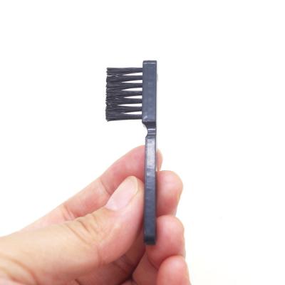 China Viable Made in China 7 Holes Portable Small Plastic Brushes Dust Cleaning Tool for sale