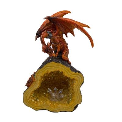 China 2021 Hotselling Artificial Polyresin Dragon Stance Geode Cave Orange Figurine Decorative for sale