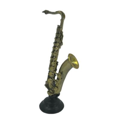 China High-grade Artificial Saxophone Item Vintage Poly Saxophone Home Decor for sale