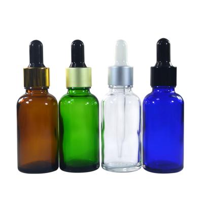 China Multifunctional Glass Bottle 5ml 10ml 30ml 50ml 100ml Clear Amber Green Blue Essential Oil Bottle With Aluminum Cap for sale