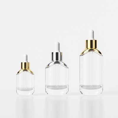 China Multifunctional Customize 15ml 30ml 50ml Clear Serum Bottles Glass Essential Oil Dropper Bottle With Metal Collar for sale