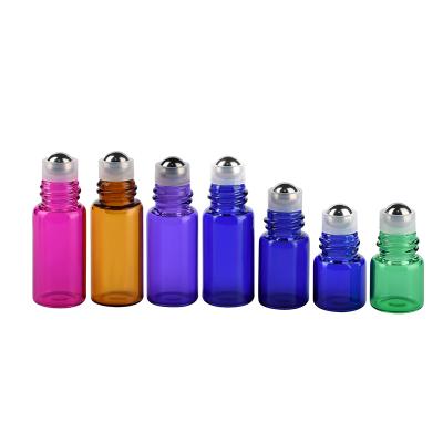 China Personal Care 1ml 2ml 3ml Clear Amber Pink Purple Green Glass Roll On Bottles Essential Oil Roll Bottles With Stainless Trackball for sale