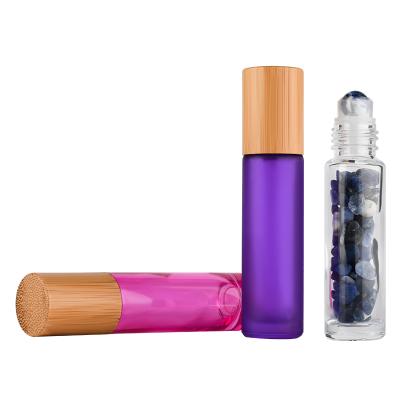 China Multi-Function Colorful Frosted Perfume 10ml 15ml Purple Green Blue Red Pink Essential Oil Glass Roll On Bottle With Bamboo Lid for sale