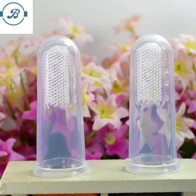 China Baby Disposable Items Fashion Kids Disposable Teeth Massage Clear Soft Silicone Baby Finger Toothbrush for sale