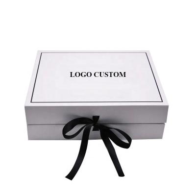 China Cloth LV Customized Gift Foldable box Ribbon hardpaper cardboard gift boxes Flip Top String Ribbon Handle Flat Paper Box for sale