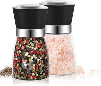 China Viable Wholesale Manual Amazon Salt and Pepper Shakers Grinders Seasoning Empty Spice Glass Bottle Jars with Grinder Top for sale