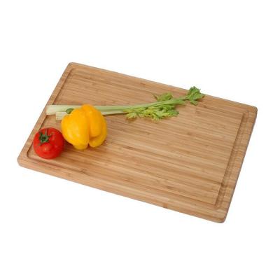 China Durable Thick Strong Bamboo Wooden Cutting Board Kitchen Choppers With Drip Groove Used For Fruits, Vegetables And Meat for sale