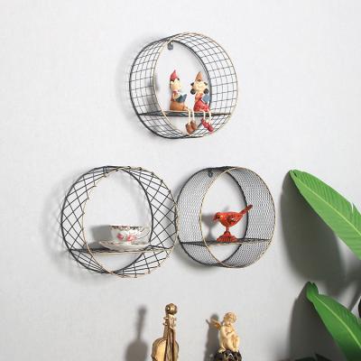 China Creative Nordic hollow round rack iron wall hanging decoration country wall net red INS wall home accessories for sale