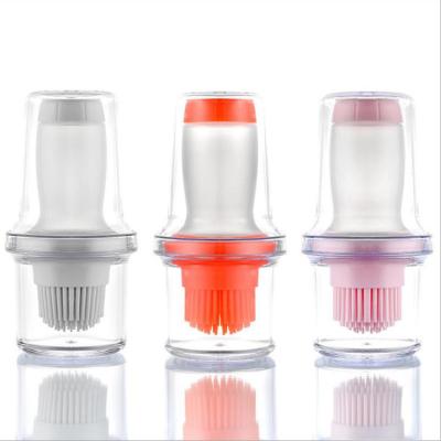 China Viable Silicone Oil Bottle Brush Sauce Brush Push Type Silicone GRILL GRILL Cook Oil Baking Brush with Storage Cover for sale