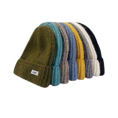 China Custom Winter COMMON Merino Wool Blended Beanie Winter Thicken Knitted Hat Mens Soft Knitted Beanie Hat for sale