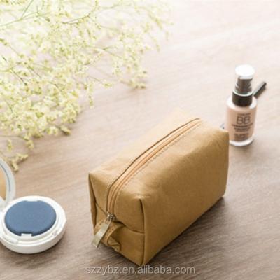 China Eco-friendly Material New Design Recycled Washable Women Kraft Paper Makeup Bag With Zipper for sale